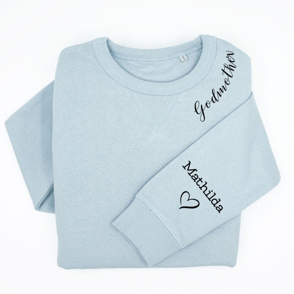 UNISEX pastellfarbenes "Sully" Sweatshirt "Taufpatin" mit Kindernamen auf dem Ärmel UNISEX pastellfarbenes "Sully" Sweatshirt "Taufpatin" mit Kindernamen auf dem Ärmel